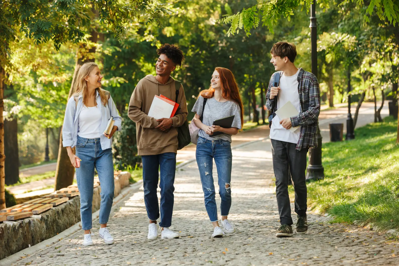 AdobeStock_221161866 (2) Group of students socializing outdoors at Campus Pointe near Kent State University
