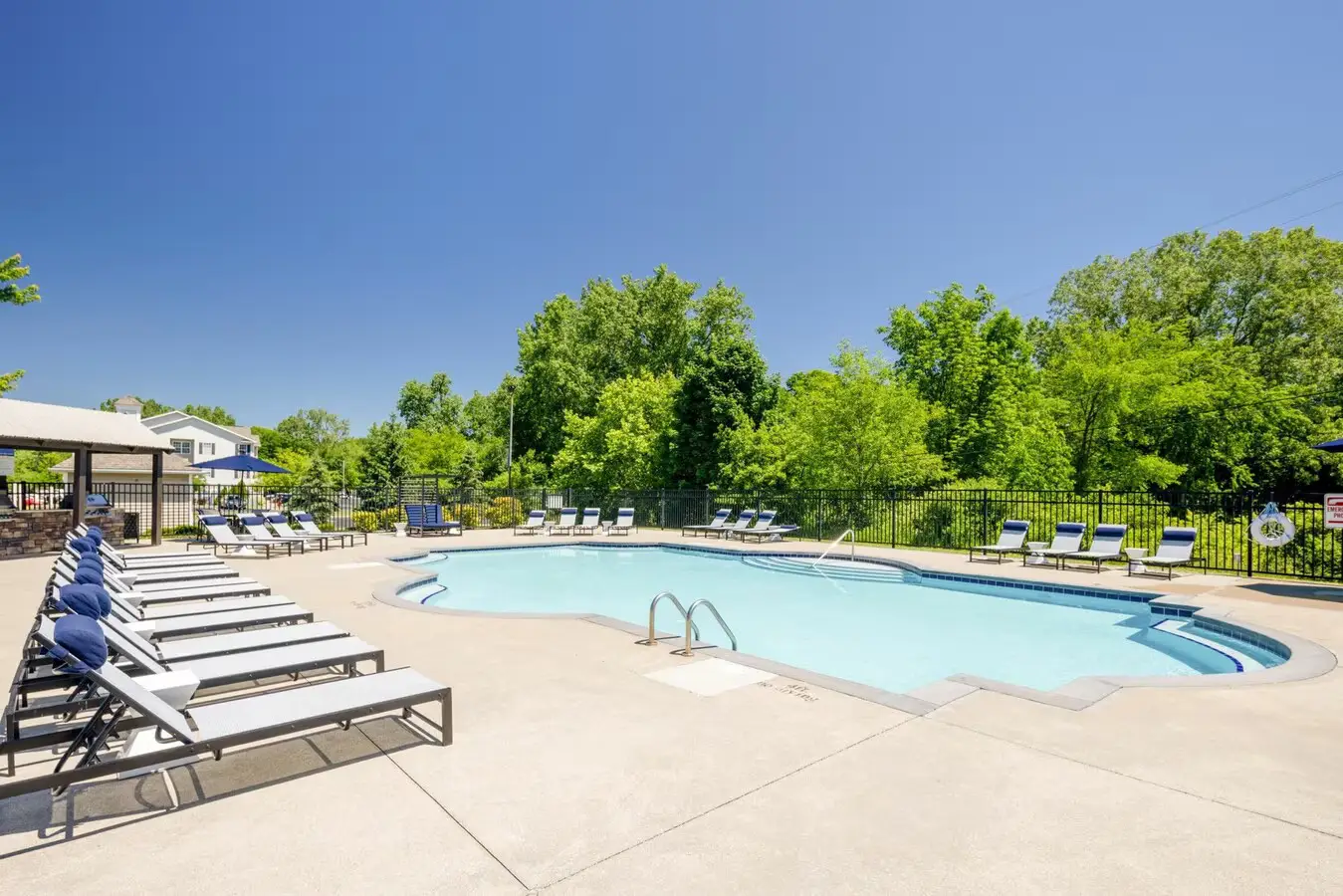 Outdoor swimming pool at Campus Pointe apartments